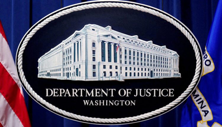 FILE PHOTO: A U.S. Justice Department logo or seal showing Justice Department headquarters, known as