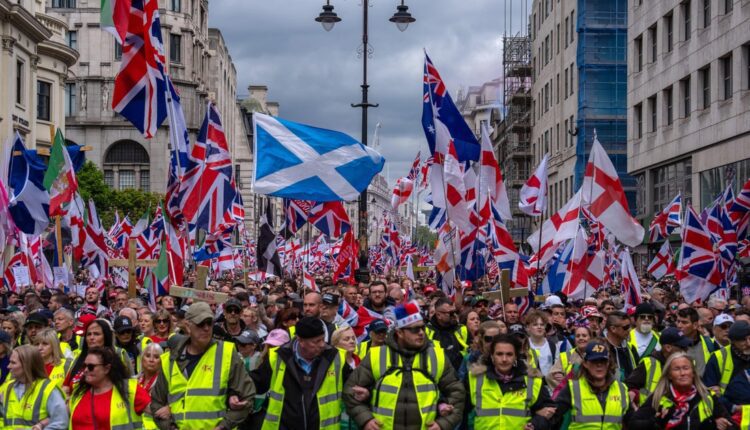 Thousands hit London streets for "Unite the Kingdom" march organized by far-right activist Tommy Robinson